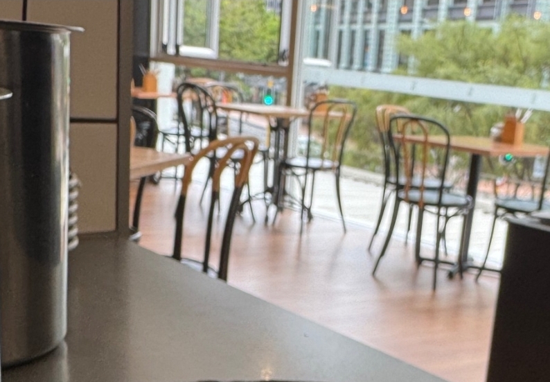 Seats by the window inside The Annexe Cafe
