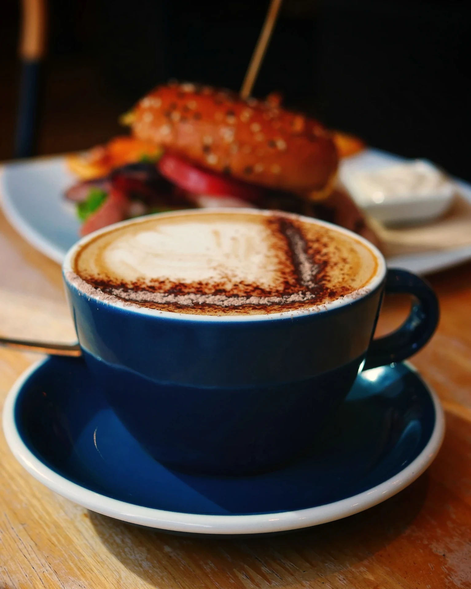 Mocha in a navy ceramic cup